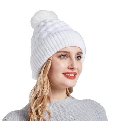 China breathable & European and American winter new women's pure wool hat color waterproof wool ball plus warm fleece scale knit hat for sale