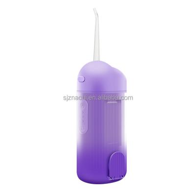 China Small And Portable Water Flosser Device Dental Irrigator Gradient Color Irrigator for sale