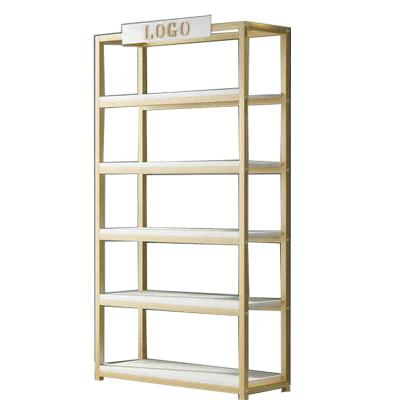 China Minimalist Shelves Beauty Salon Shelves Simple Manicure Cosmetic Shelf Display Cabinet Multifunctional Display Cabinet for sale