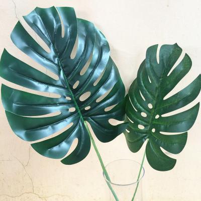 China Wedding Green Artificial Leaf Hanging Wall Plant Decorative Turtle Leaf Vine for sale