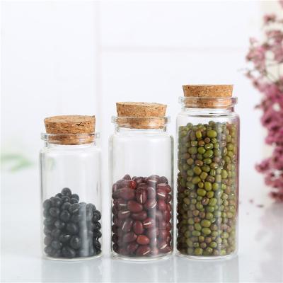 China Glass Vials 10ml Small Round Thin Cylinder Glass Tube Cover Screw Cap Spice Jar Roll On Bottle With Cap for sale