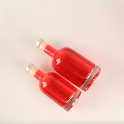 China Transparent Long Thin Round Neck Packaging Glass Bottle For Ice Wine Thick Bottom Round XO Square Shape Fruit Wine Liquor Glass Bottle for sale