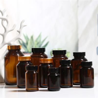 China Factory Wholesale Price Amber Small Glass Storage Jar Packaging Jar Airtight Pill Bottle for sale