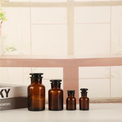 China Factory wholesale price 30ml 150ml 500ml 1000ml pill apothecary packaging amber glass reagent bottle for sale