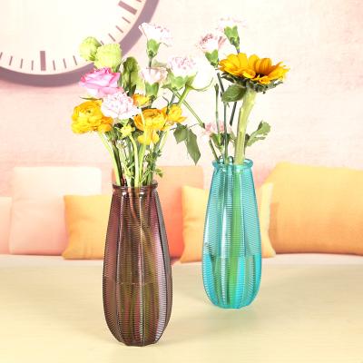 China Decorative Environmental Unique Clear Glass Jar Fashion Flower Vase Decorative Flower Vase With Color for sale