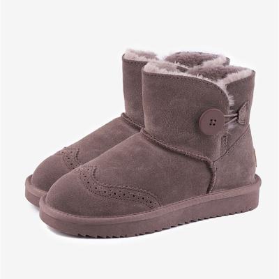 China Fashion trend new cowhide cut out tube frosted low women's snow boots cotton boots for sale