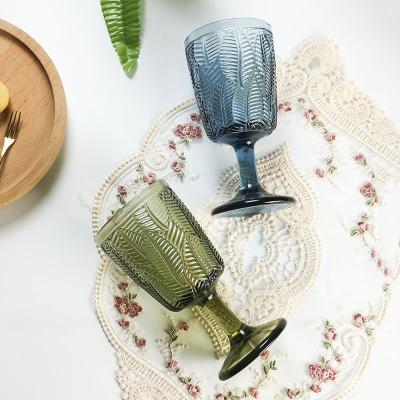 China Food Grade Safe Items Wholesale Leaf Vintage Green Colored Goblets Pressed Wine Goblets for sale