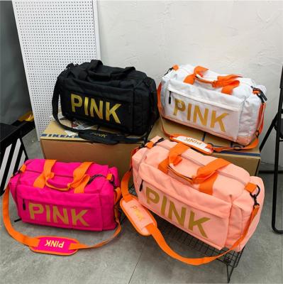 China 2021 Fashionable Brand New Duffel Bag Large Capacity Spend Overnight Bag Custom Logo Yoga Gym Travel Bag Night Women for sale