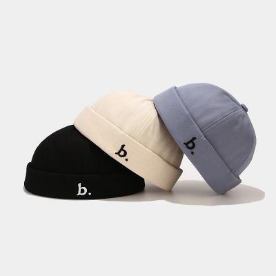 China COMMON Cotton Caps Brimless Embroidery Logo Sports Hats for sale