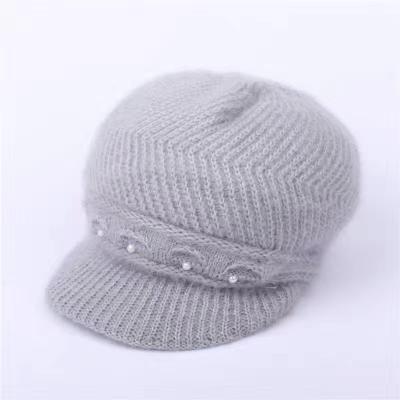 China Women COMMON Custom Acrylic Knit Brim Winter Hat Sun Visor Beanie for sale