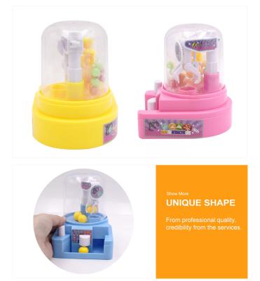 China Cartoon Toys Shantou Candy Factory Kids Mini Toy With Candy Latin America Sugar Grabber Vending Machine Candy Toy for sale