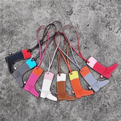 China Stylish China Boots Shape Handmade Cowhide Bag Charms Color Match Real Leather Key Chain Purse for sale