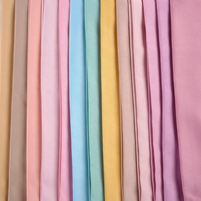 China Hot Sale Polyester Satin Jacquard Fabric Shrink-Resistant Woven Fabric For Pants for sale