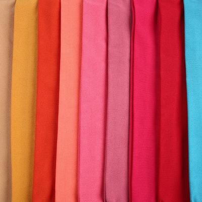 China Tear-Resistant Single Polyester Crepe Polyester Foam Scarf Garment Knitting Fabric China for sale