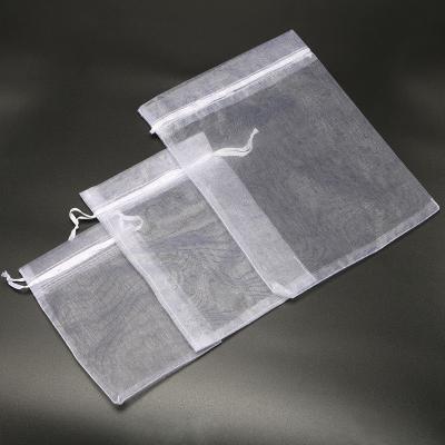 China Custom Logo Small Mini White Color Cotton Mesh Feather Satin Pocket Organza Drawstring Gift Wrapping Bag for sale