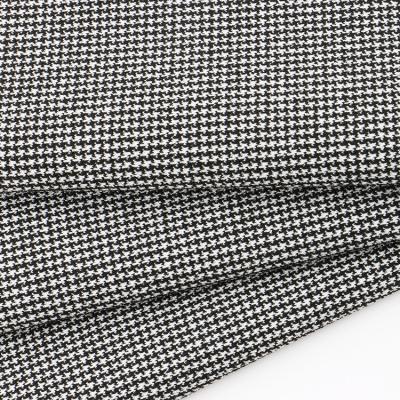 China Anti Pill Top Stretch Polyester Spandex Dobby Houndstooth Crisp Fabric Suit for sale