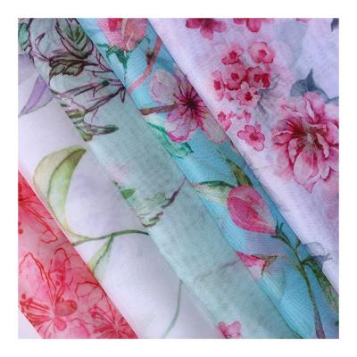 China Beautiful flower dirac Tear-resistant printed Somali light and transparent stock silk chiffon fabric for scarf and dress for sale