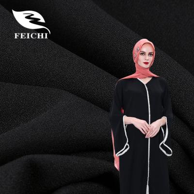 China Memory Indonesia 100% Arabic Muslim 150D foam formal black crepe poly fabric for abaya for sale