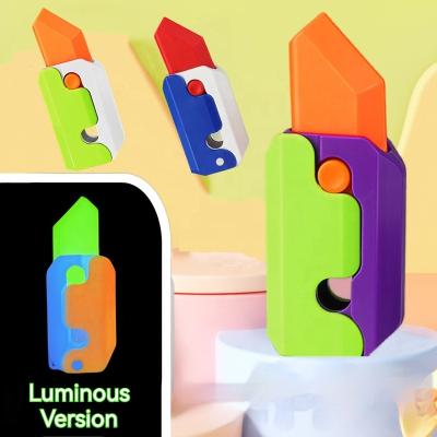 China Relieve Stress Toys Anti-anxiety Stress Fidget Person 3d Funny Luminous Small Gravity Radish Carrot Knife Retractable Toy for sale