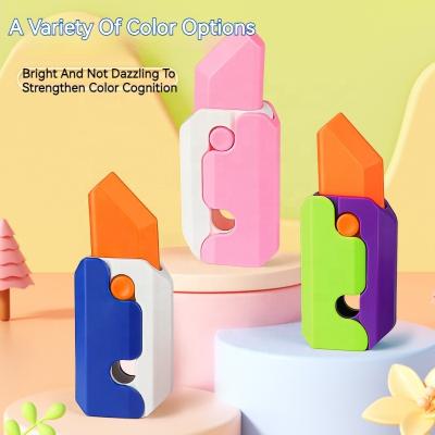 China Relieve Stress Toys Newcomer Anti-anxiety Stress Toys Small Fidgeting Person 3d Funny Luminous Gravity Radish Carrot Knife Retractable Toy for sale