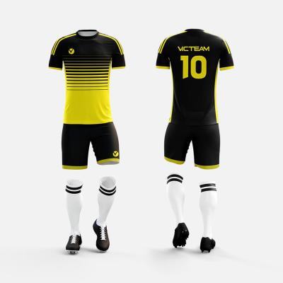 China Breathability Custom Made Eco-Friendly Fabric Kids Black Yellow Football Kit Jersey Uniform Set for sale