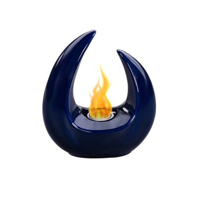 China Stocked horn shaped modern ethanol fire place on table top for sale