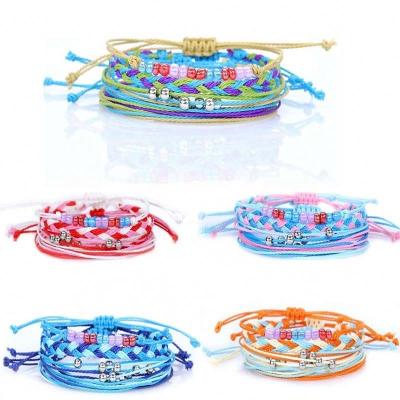 China TRENDY Fashion Boho Seed Beads Jewelry Sets For Women Girls Colorful Wax Thread Beaded Bracelet Set 4pcs Handmade Weave Charm Bracelets for sale