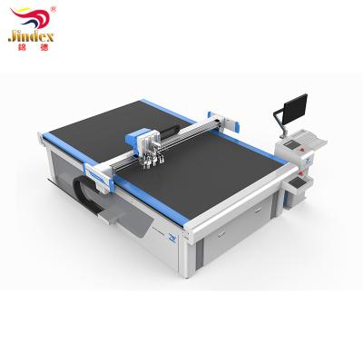 China Garment Shops Jindex Material Packaging Cutter Cardboard Package Slitter With Full Automatic Conveyor Table And Computer for sale