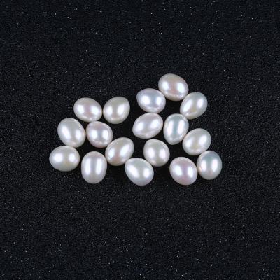 China Natural Freshwater Pearl Pearl Beads 9.5-10mm AAA White Rice Loose Beads DIY Making for sale