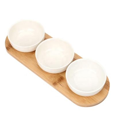 China Hot Mordern Turned Snacks Nut Fruit Cheese Ceramic Dishes Set With Bamboo Tray For Serving Dishes Serving Tray for sale