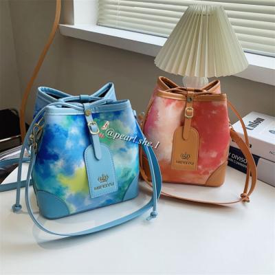 China Fashion Tie-dye luxury brand painted 2021 new large-capacity anticline women's bags simple women's purses and handbags for sale