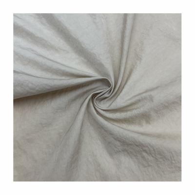 China Breathable Low Price Dyed Lightweight Woven 350T Nylon Crepe Taffeta Fabric For Downjacket for sale