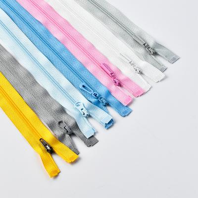 China Auto Lock Custom Colored 3# Length Open End Nylon Zipper With Metal Slider for sale