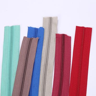 China Professional Durable Nylon Auto Lock Open End Auto Lock Coil Zipper Tape for sale