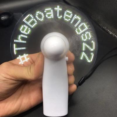 China Mini and Portable White Handheld Traveling Flash Words LED Fan Mini Ventilation Custom Message LED Air Cooling Fan for sale