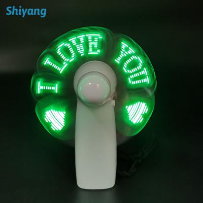 China Custom Led Hand Fan Text LOGO And Message Mini And Portable Wedding Fan Decoration Mini Gift for sale