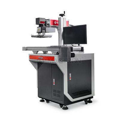 China CCD CCD Fiber Laser Marking Engraving Machine With Flight System For Production Date Qr Code Logo Marking for sale