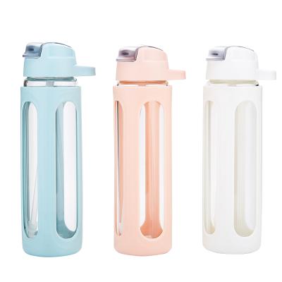 China Custom Sustainable Design Private Label Fashion Borosilicate Drinking Glass Shatterproof Water Bottle With Silicone Sleeve Straw for sale