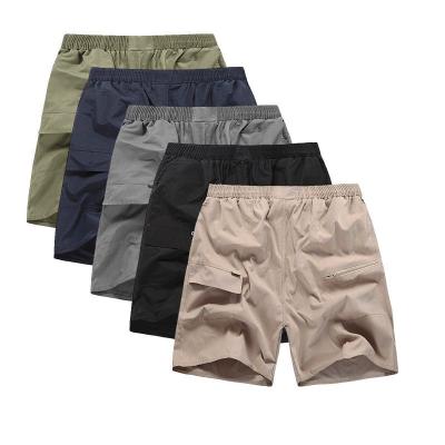 China Anti-wrinkle men beach casual briefs pants panel shorts with pocket trunks beach wear 2018 wholesale camouflage print shorts for men for sale