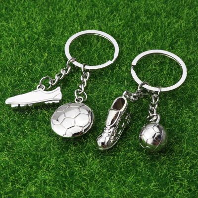 China Custom Woodkeychain Custom World Cup Sports Gift Key Ring Rubber Shoes Pendant Creative Metal Football Key Chain European Fans Souvenir Gift for sale