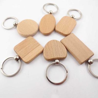 China Keychain or gift lettering key chain small metal beech wooden wooden pendant for special graduation gift custom rubber woodkeychain for sale