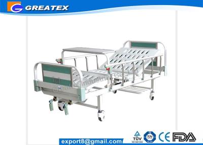 China CE ISO Approved Durable frame Steel Headboard Manual Hospital Bed With Foldable Table for sale