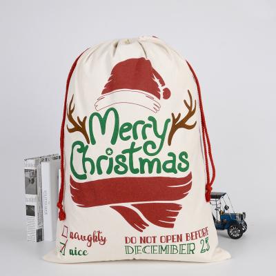 China 100% Eco-Friendly Santa Claus Pattern Canvas Christmas Gift Envelope Calico Drawstring Bags for sale