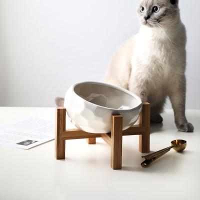 China Wholesale High Quality Non-automatic Unique Faceted Ceramic Design Dogs Cats Food Feeder Round Pet Bowls With Wooden Shelf for sale