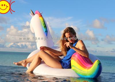 China Customized Rainbow PVC Inflatable Water Pool Unicorn Floats For Kids for sale