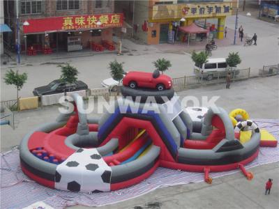 China UV - Resistance Attractive Safety Garden Inflatable Obstacle Course With Slide for sale