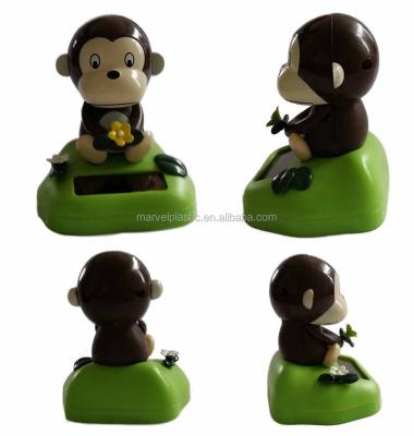 China Eco-Friendly Monkey Toy Dashboard ABS Solar Figure for sale