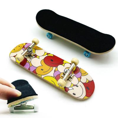 China Mini Finger Skateboard Complete Professional Youth Maple Fingerboard Wood Board With Ball Bearings for sale