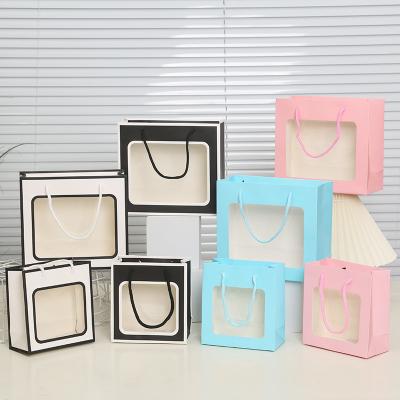 China Recyclable Wholesale Transparent Paper Bag Gift Bag For Flower Handle Shopping Paper Bags With PVC Window for sale