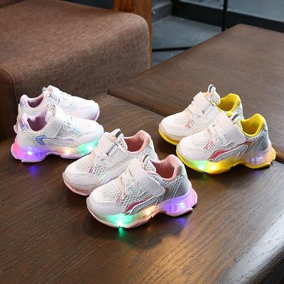 China Fashion Boys Girls Kids Running Shoes Breathable Sneakers LED Light Up Luminous Sports Shoes For Wholesale for sale